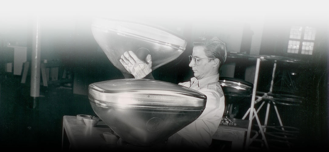 Historic photo of an employee working with a cathode ray tube.